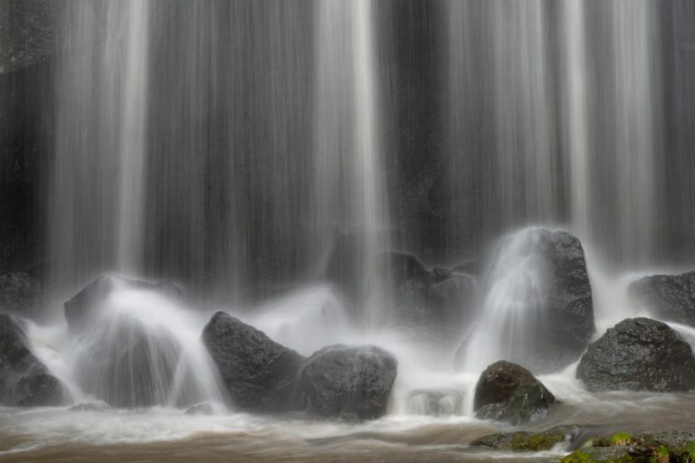 Waterfall water falling on top the stones