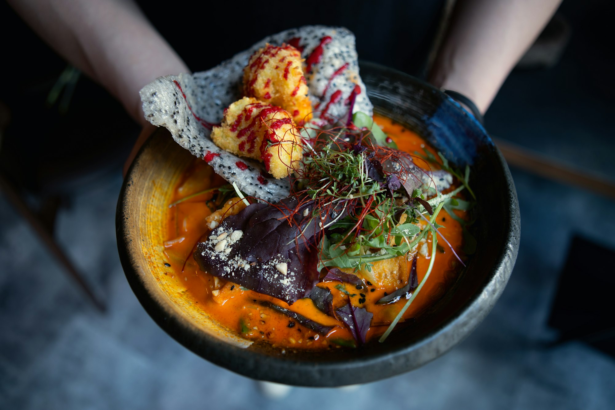 Man eating healthy asian soup